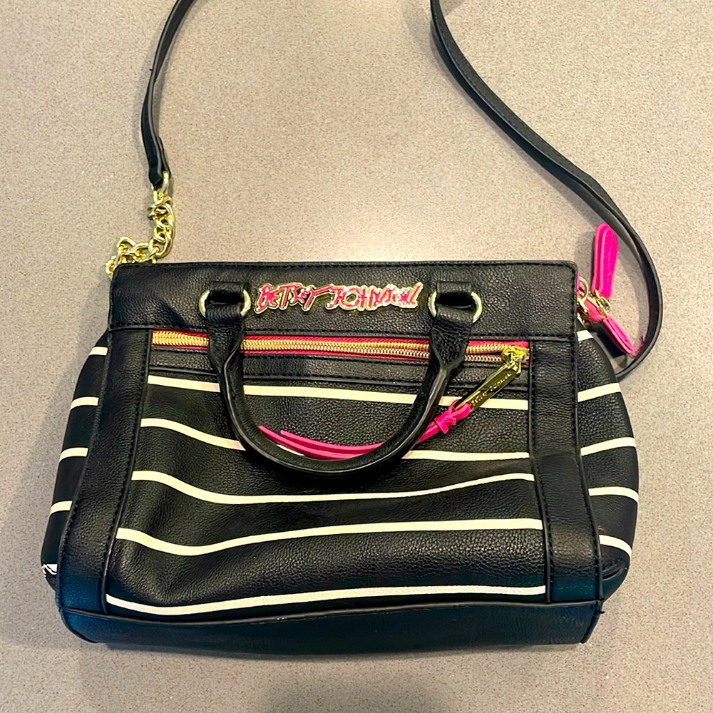 Betsy Johnson black bag. Kept up very well.